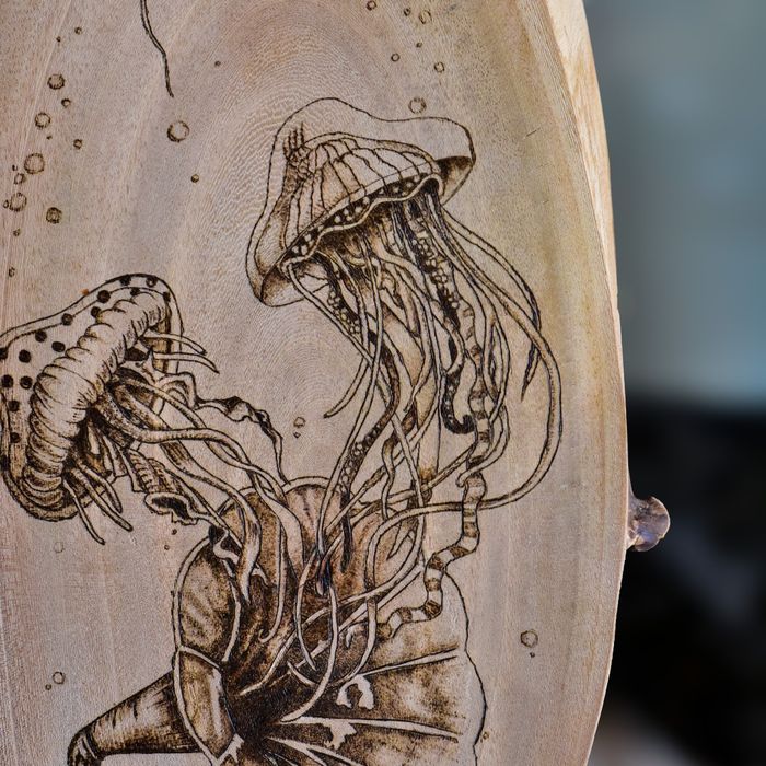 Detail of Submerged Song: a jellyfish with trailing tentacles above the gramophone horn